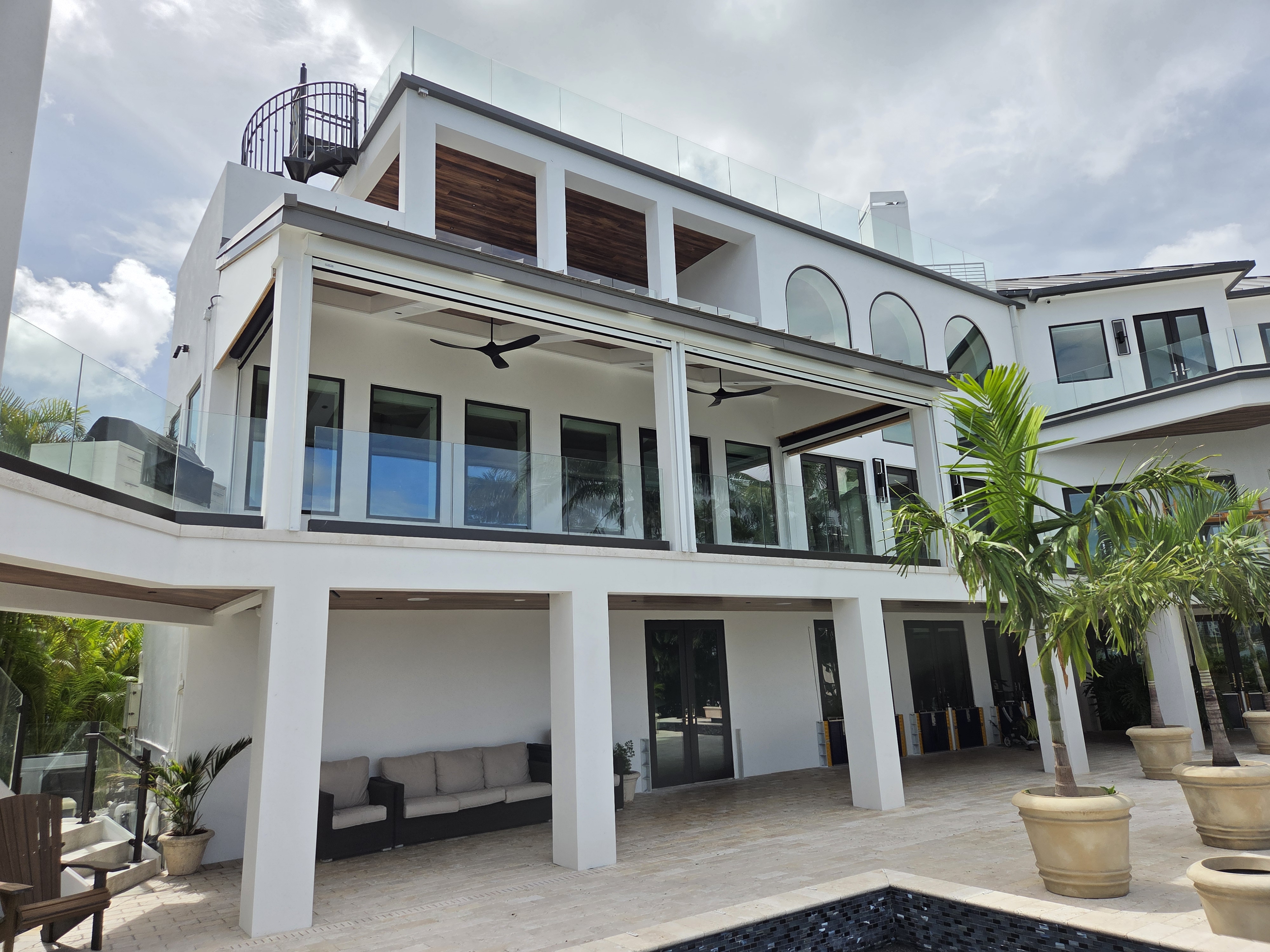 Motorized retractable screens on a Sarasota waterfront home