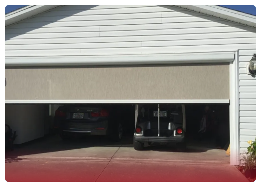 Motorized screens for garages and carports